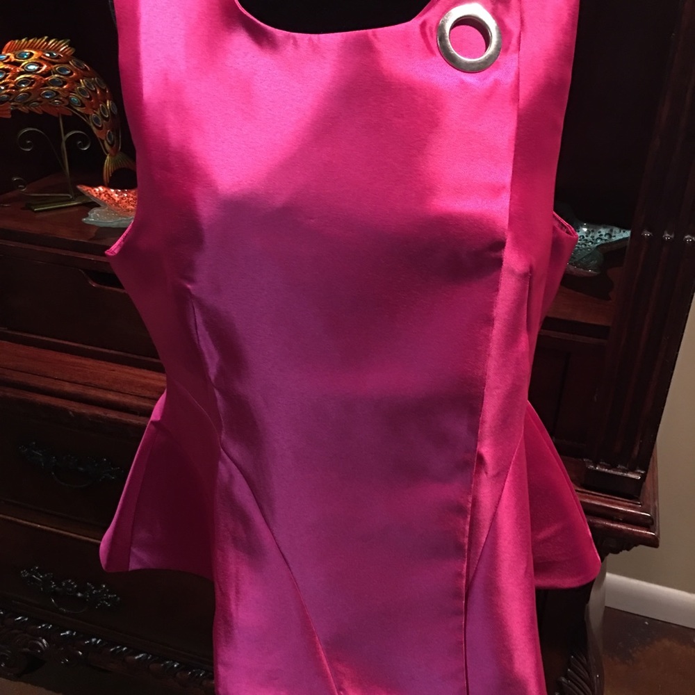 Pink top with silver ring and flares at the tail.